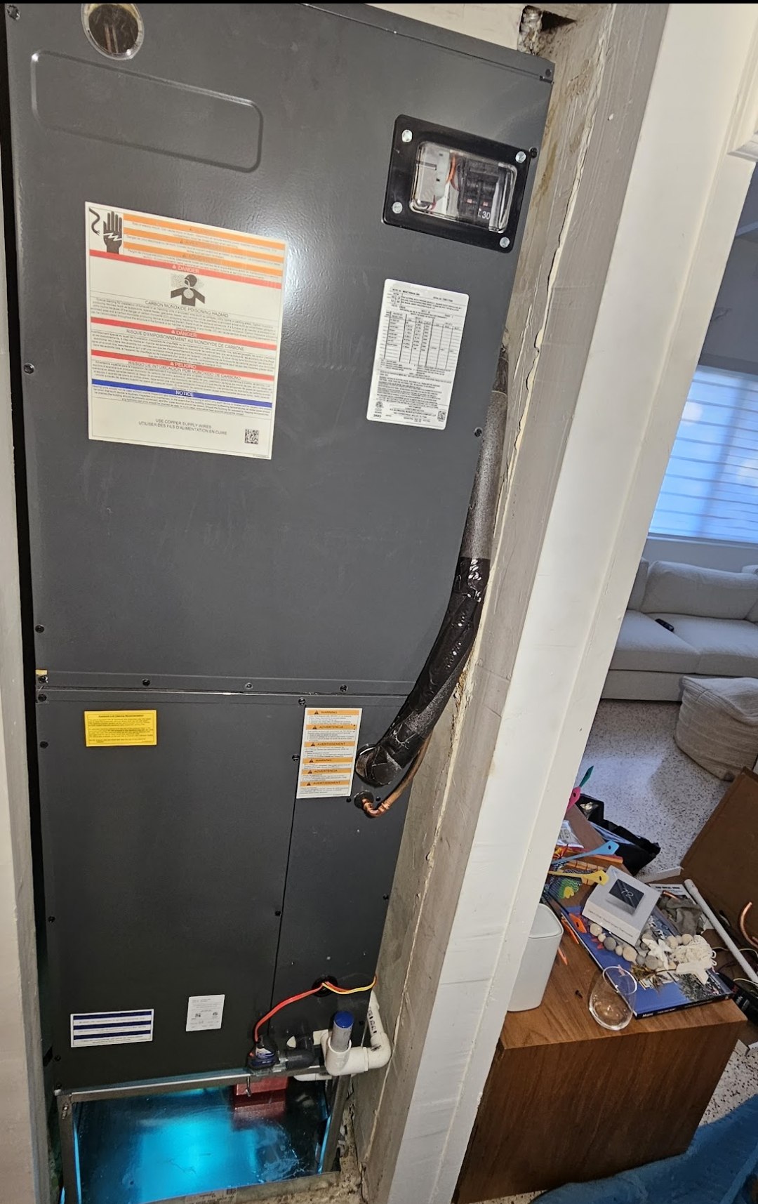 New air handler installed in a hallway closet